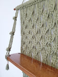 Emply dark macrame shelf