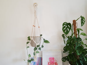 Macrame hanging planter with copper beads